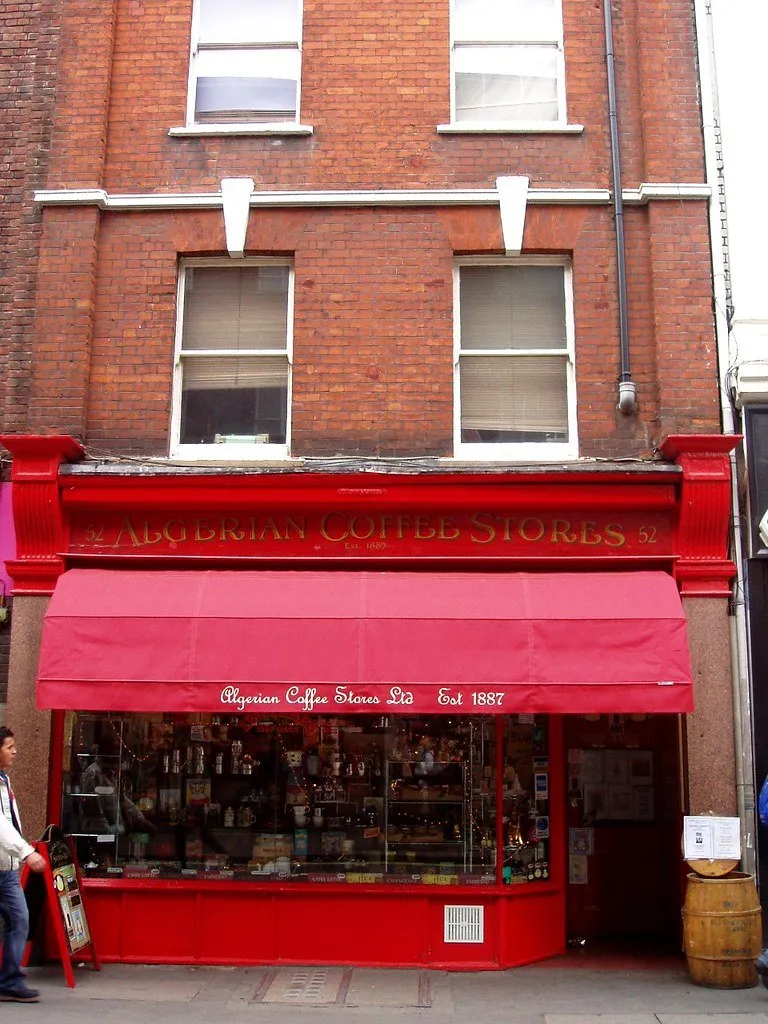 The red-painted Victorian shopfront of Algerian Coffee Stores on Old Compton Street