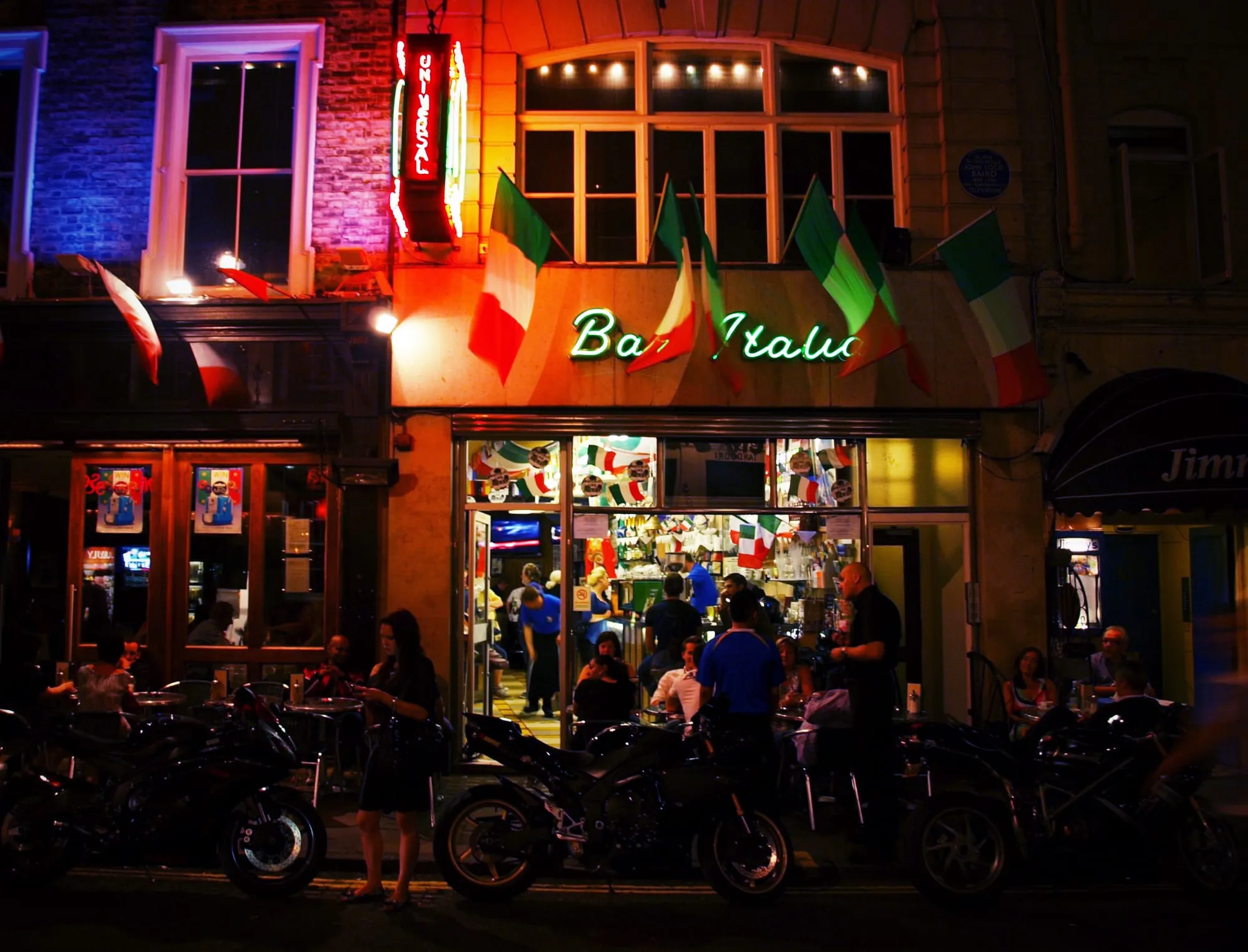 The neon frontage of Bar Italia on Frith Street at night