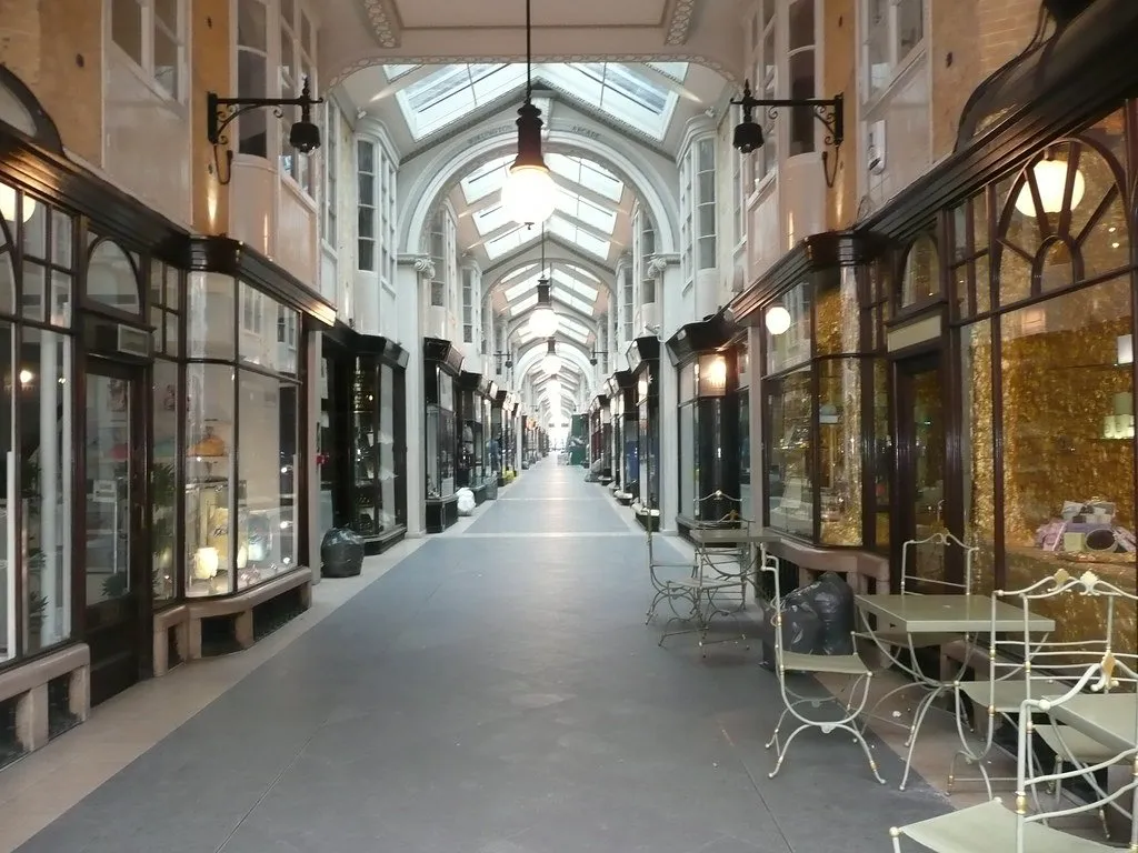 The glass-roofed Burlington Arcade lined with jewellers' windows