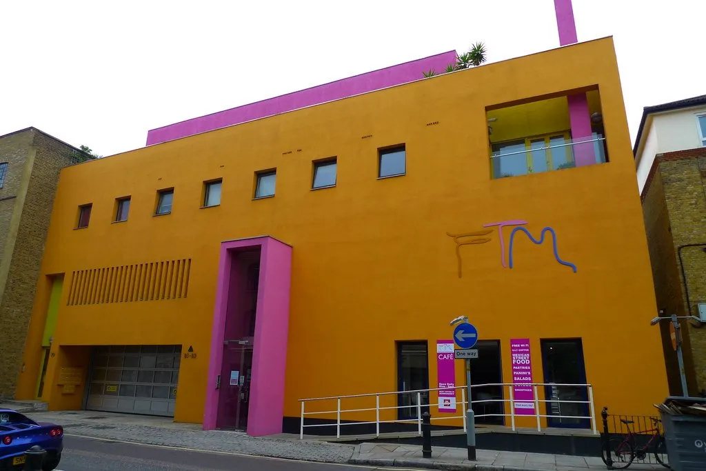 The orange and pink exterior of the Fashion and Textile Museum on Bermondsey Street