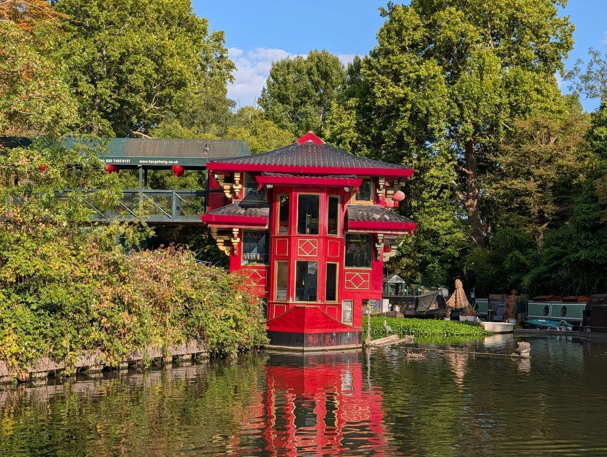 The Feng Shang Princess, a red three-tiered Chinese pagoda restaurant moored on the Regent's Canal