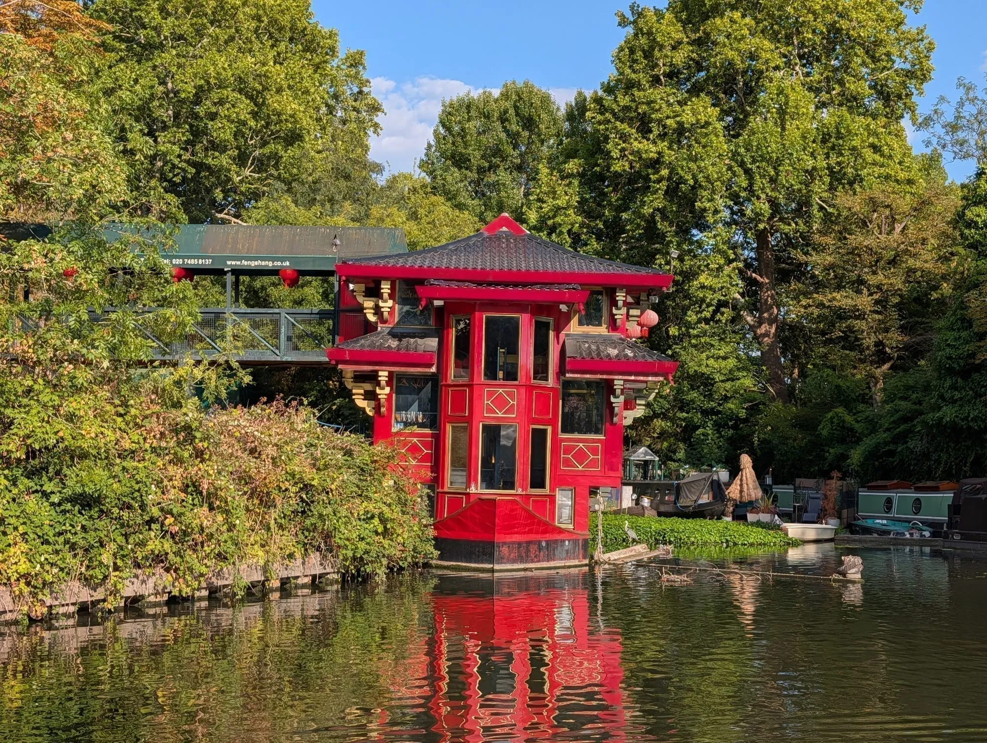 The Feng Shang Princess, a red three-tiered Chinese pagoda restaurant moored on the Regent's Canal