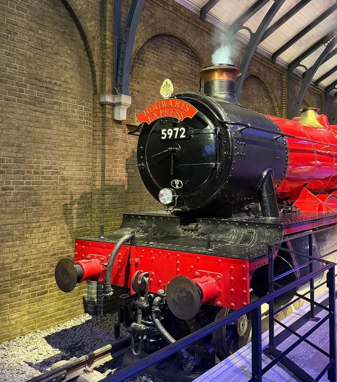 The Hogwarts Express locomotive, number 5972, standing at the recreated Platform 9¾ inside the Studio Tour