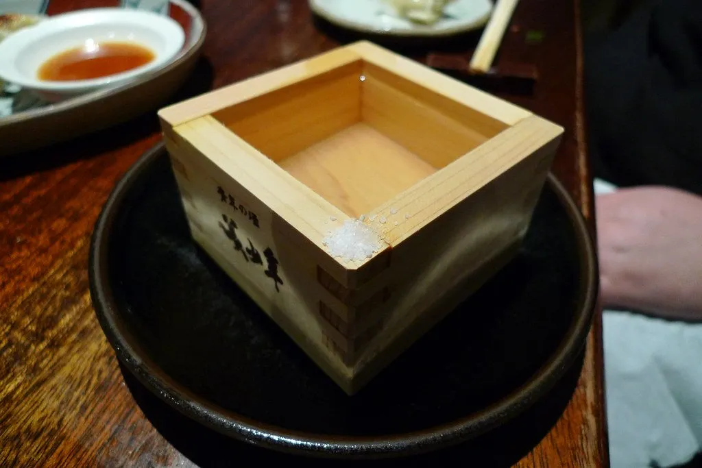 Salmon roe over grated daikon in a ceramic bowl