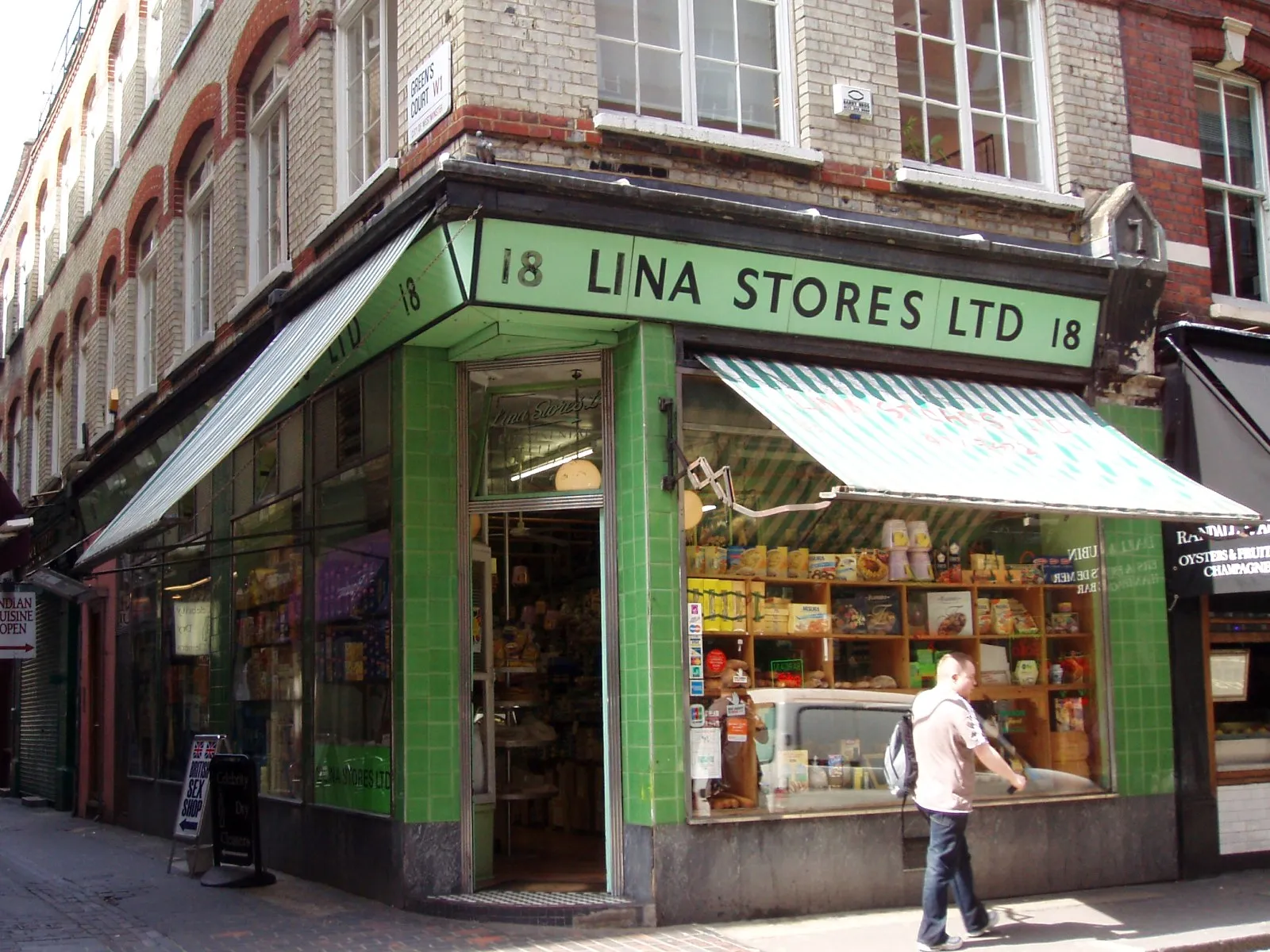 The mint-green frontage of the Lina Stores deli on Brewer Street