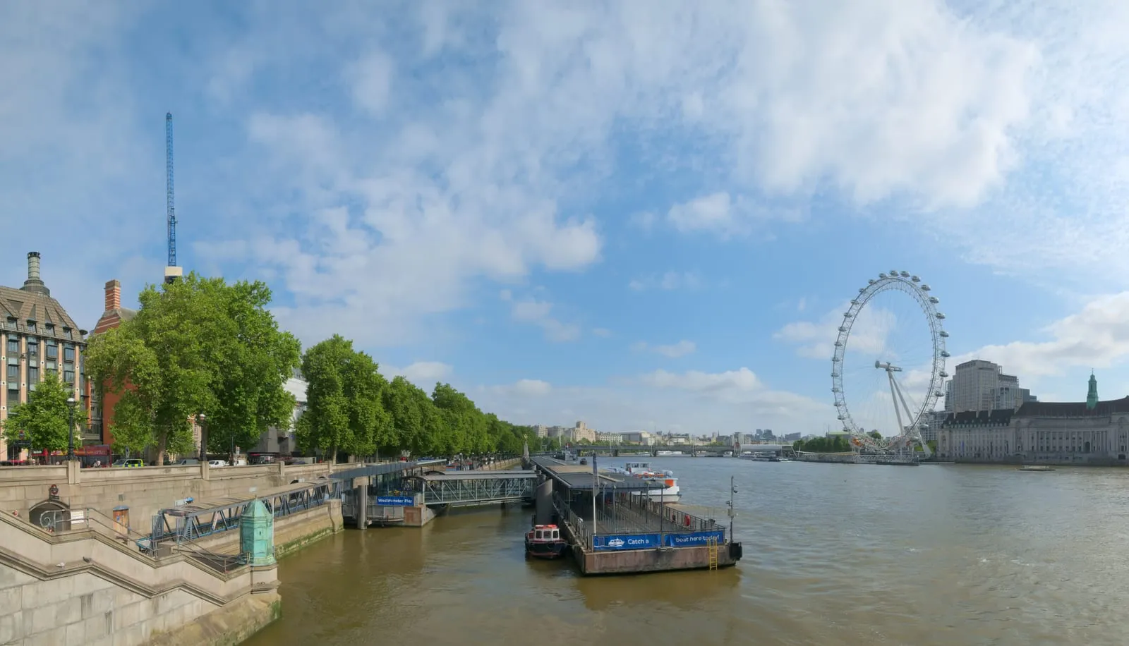 The cantilevered London Eye observation wheel on the South Bank of the River Thames viewed from Westminster Bridge