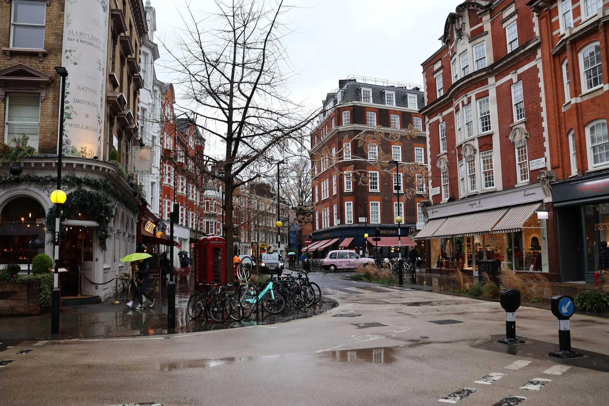 Marylebone High Street on a wet winter afternoon, with the boutiques and mansion blocks of Marylebone Village