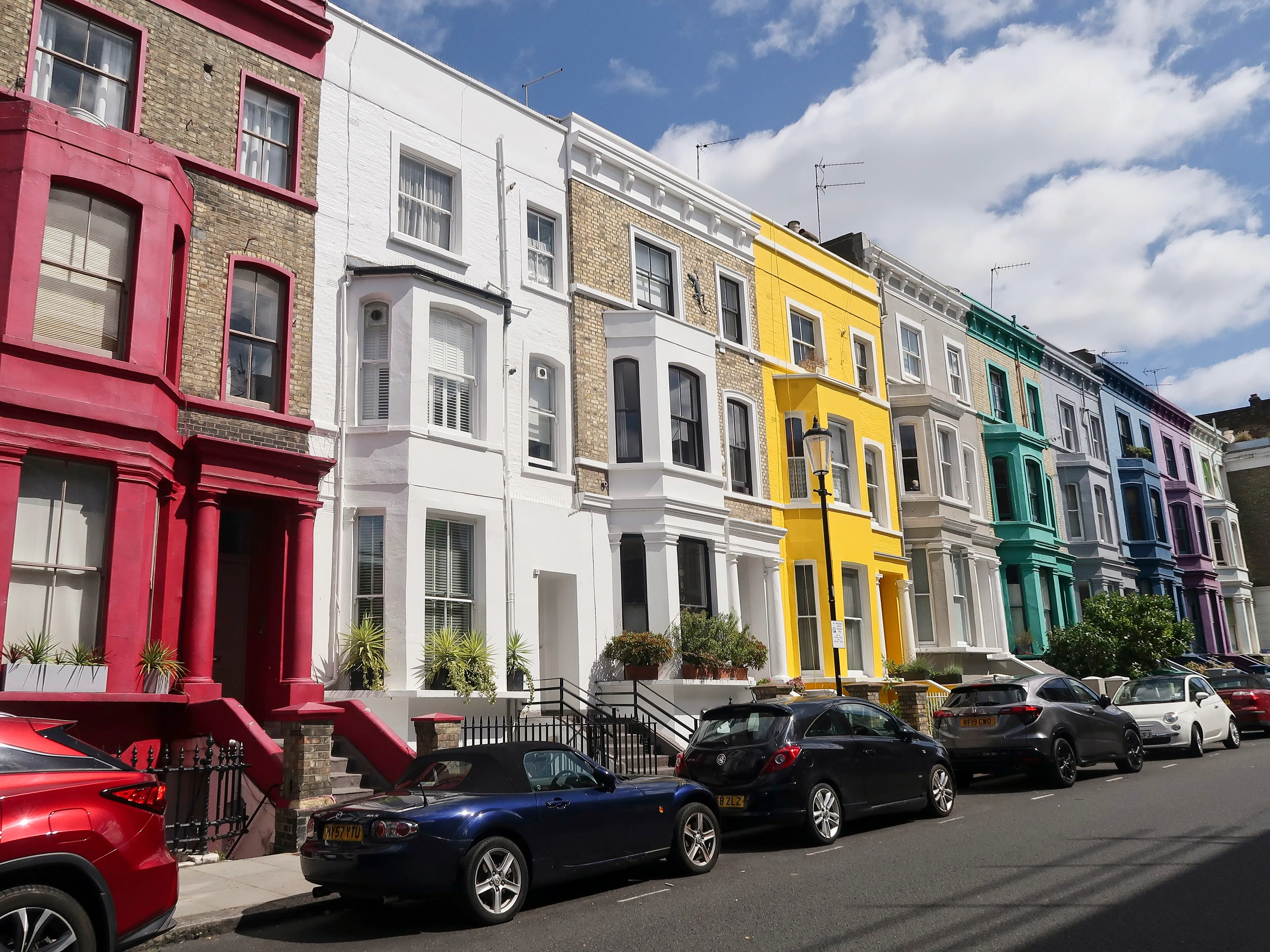 A row of colourful houses on Lancaster Road in Notting Hill