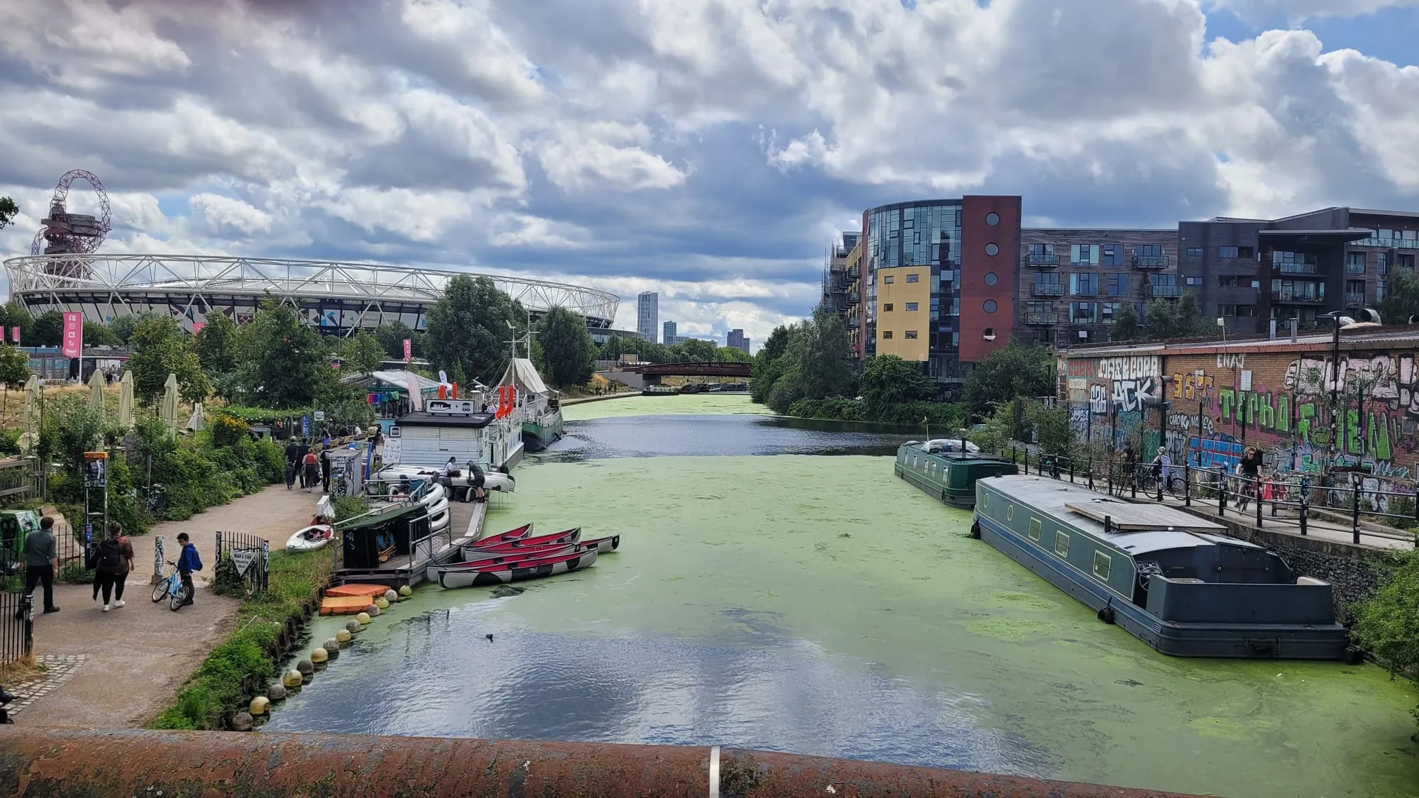 The London Stadium and the ArcelorMittal Orbit seen across the River Lea from Hackney Wick