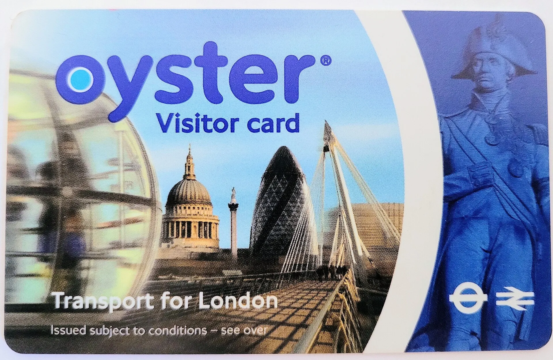A Visitor Oyster card on a white surface