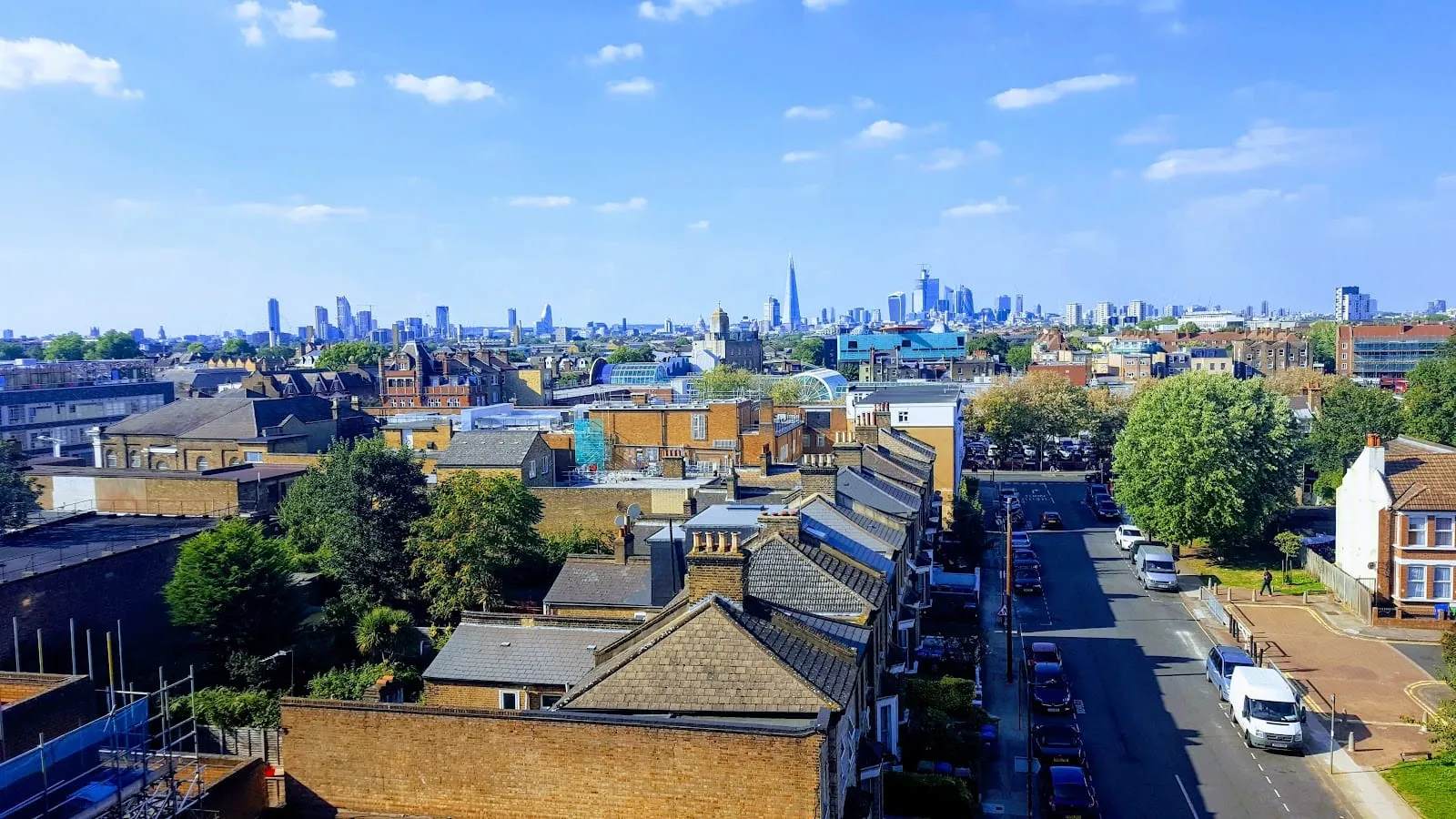 The view from a high floor of the Peckham Levels car park, over terraced rooftops toward the City skyline