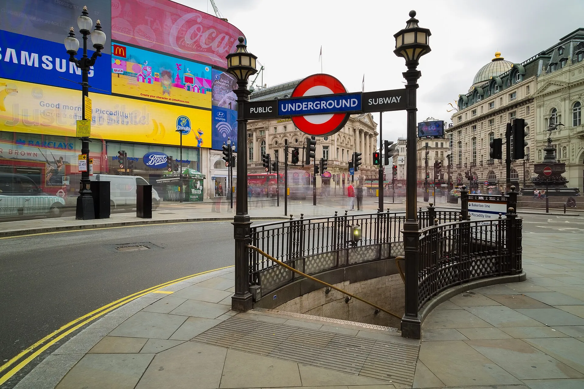 The London Underground entrance at Piccadilly Circus, with the red and blue roundel above the stairs