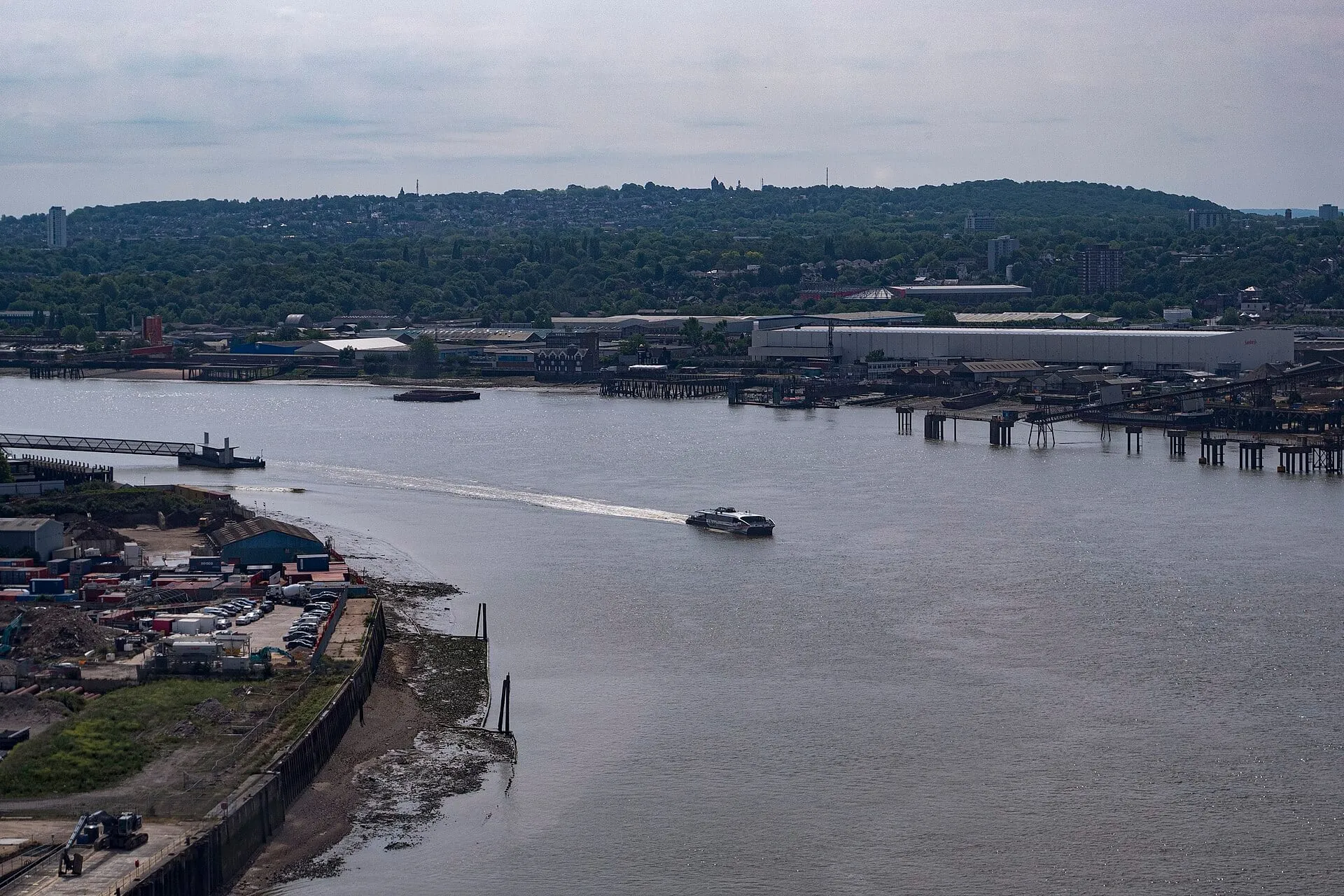An Uber Boat by Thames Clippers River Bus travelling along the River Thames