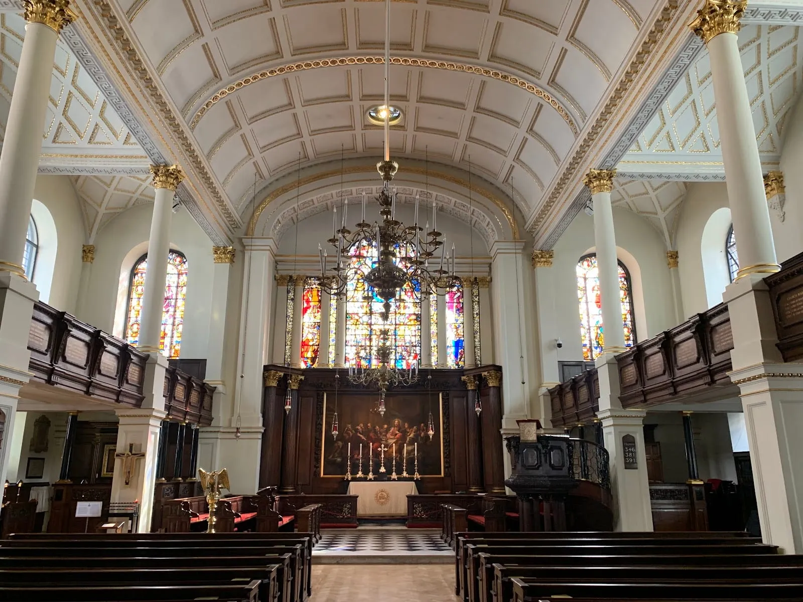 The barrel-vaulted interior of St George's, Hanover Square, looking towards the William Kent Last Supper painting above the altar