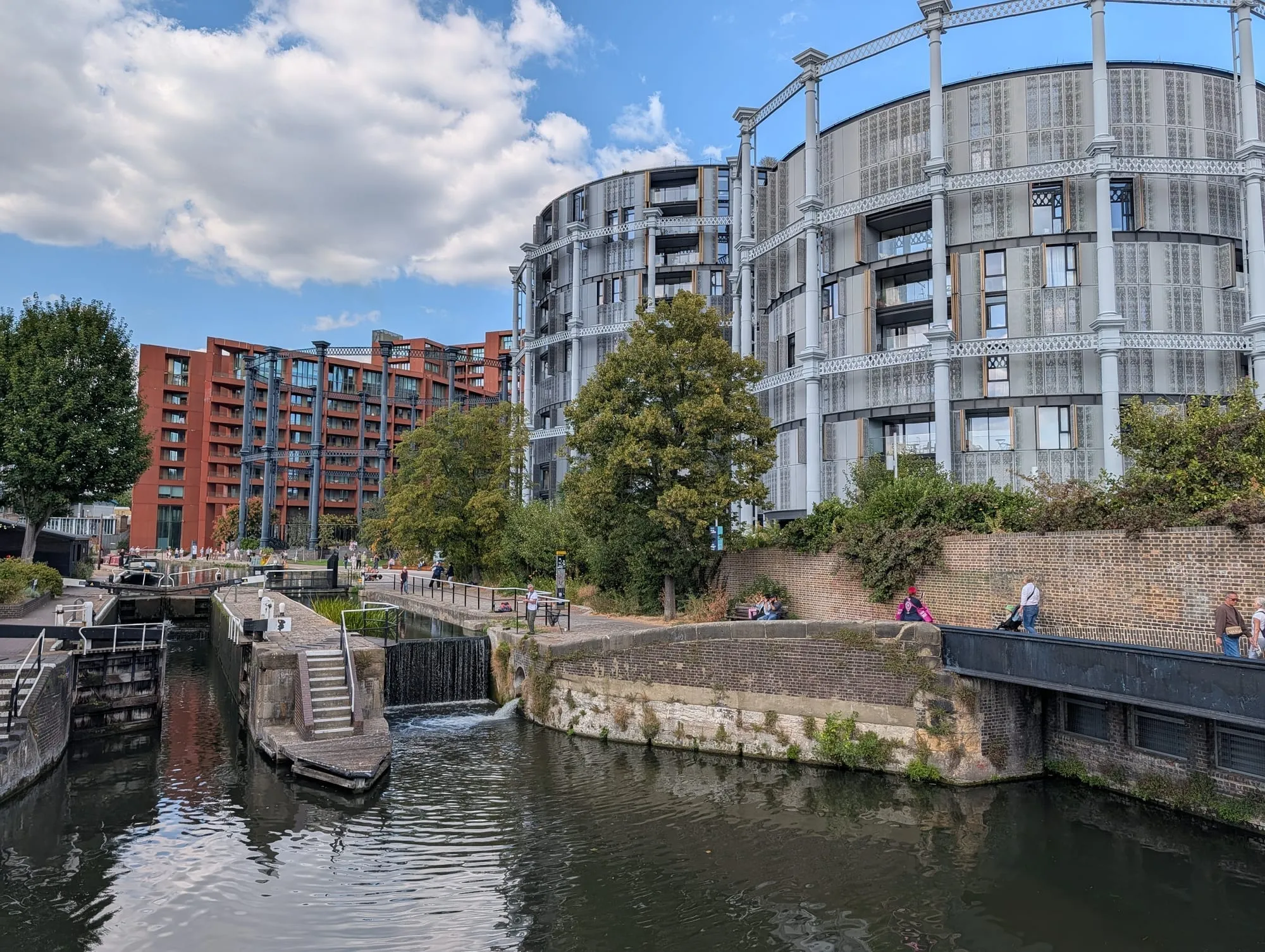 St Pancras Lock on the Regent's Canal, with the restored Victorian gasholder frames behind it