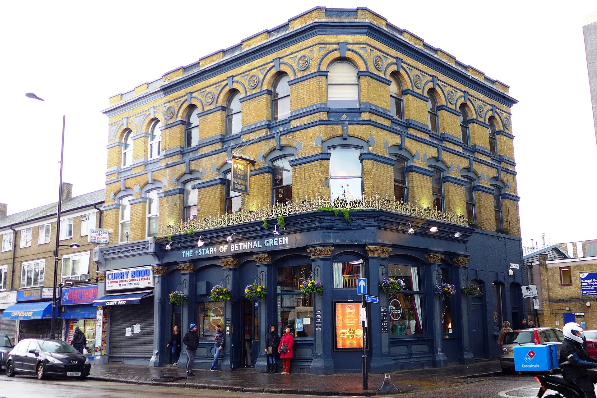 The Star of Bethnal Green, a three-storey Victorian corner pub with a dark blue ground floor and yellow-brick upper floors