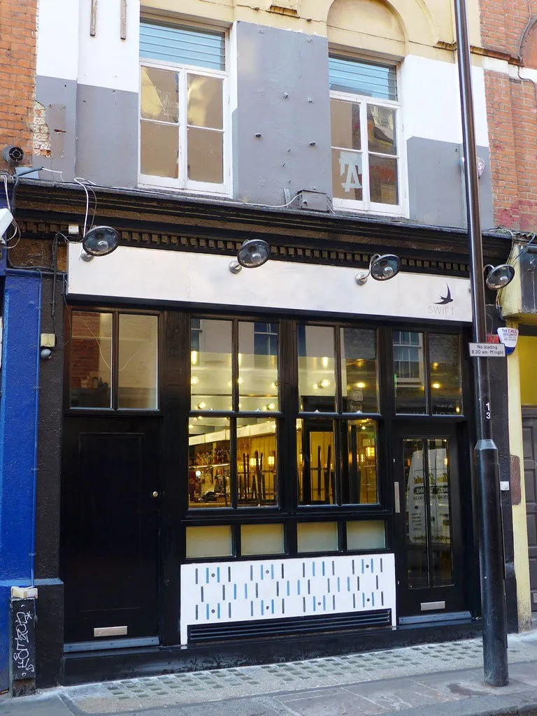 The blue frontage of Swift on Old Compton Street