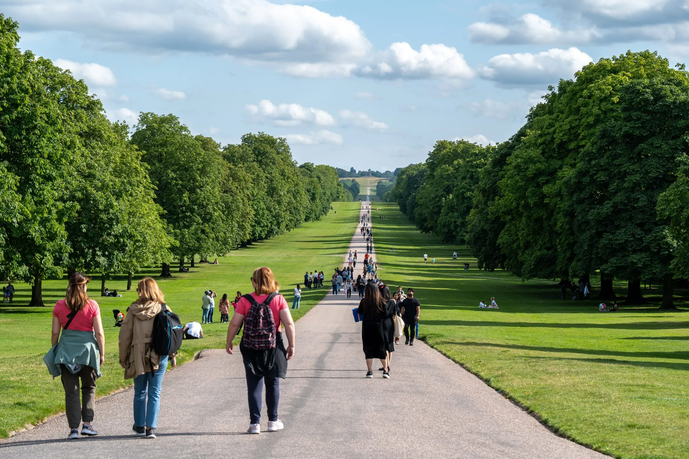 The Long Walk at Windsor, a straight avenue of trees running away from the castle with people strolling down it