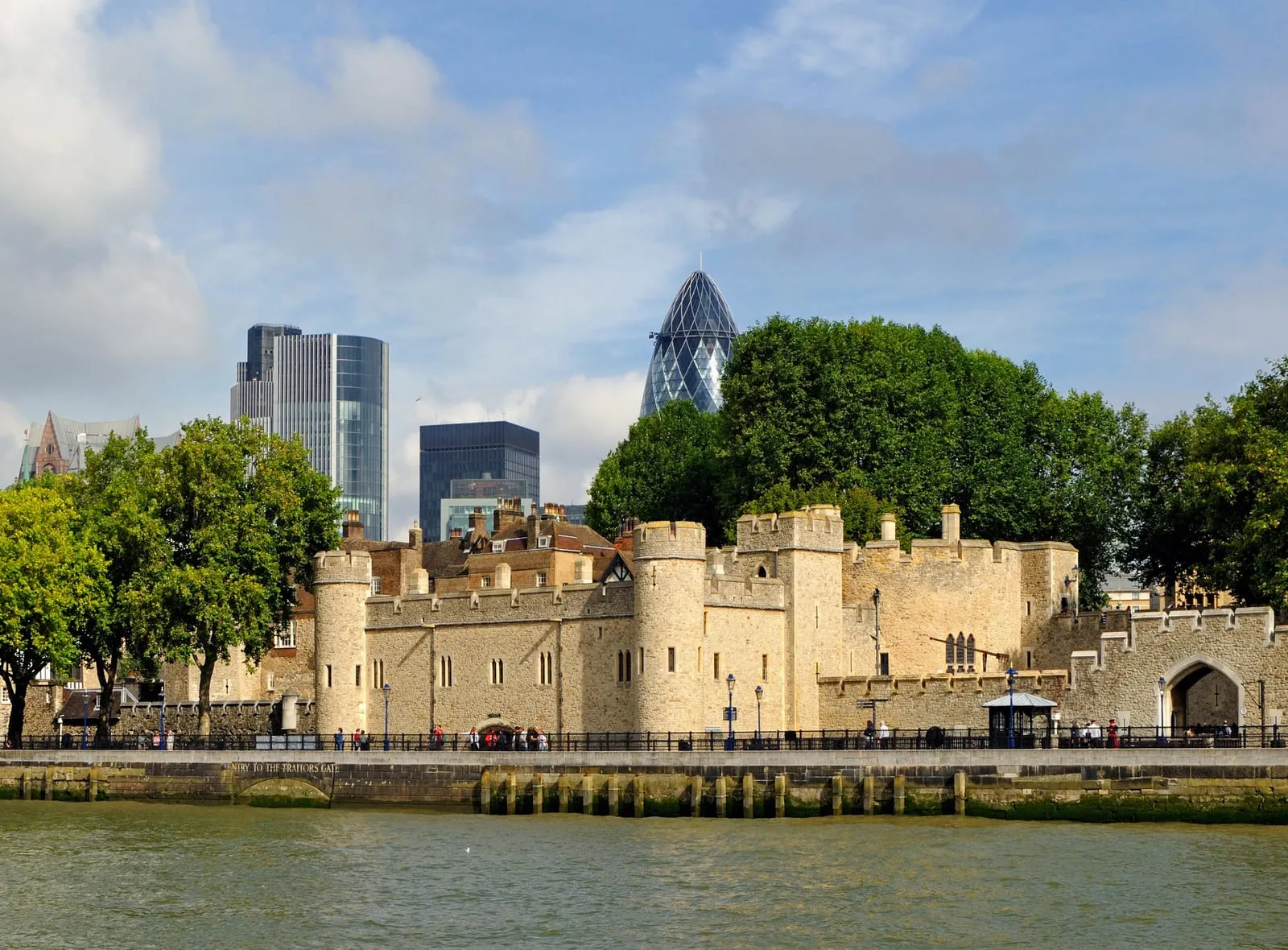The arched stone opening of Traitor's Gate beneath St Thomas's Tower viewed from the Tower wharf