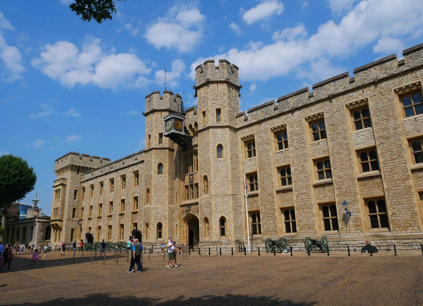 The long Gothic revival facade of the Waterloo Barracks inside the Tower of London, home to the Crown Jewels